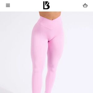 Buffbunny candid crossover waist leggings in lover pink size medium.